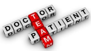 tiles spelling out doctor, patient, and team