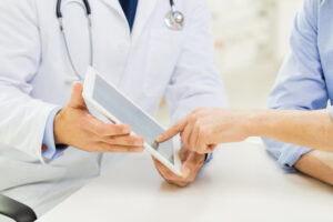 doctor presenting information to a patient