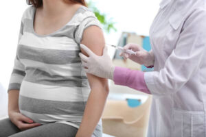 pregnant person receiving a vaccine